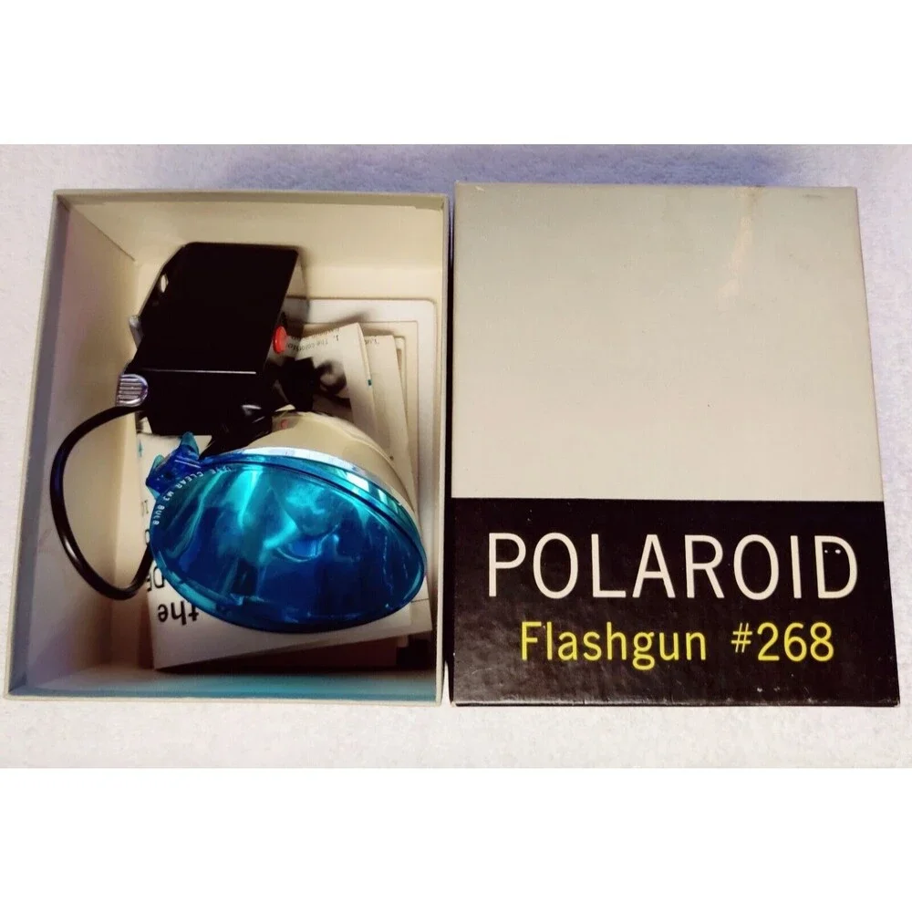 VINTAGE POLAROID FLASHGUN #268 WITH BOX AND MOUNTING POINTS & CLIP